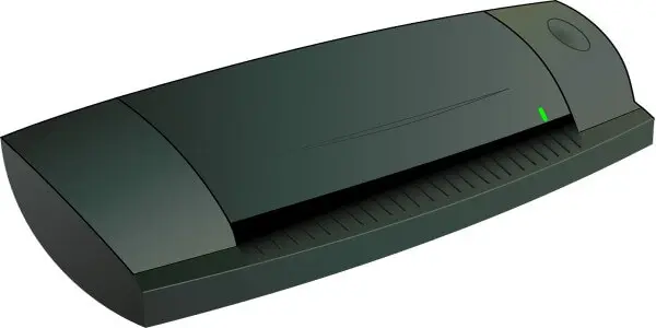 Mini scanner portable en train de numériser un document